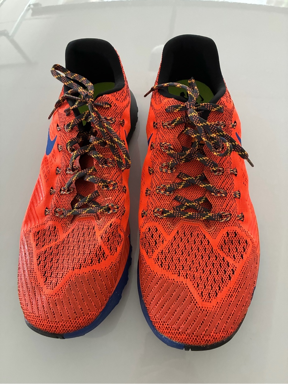 Nike Men’s Bright Orange Athletic Running Shoes with Blue Logo